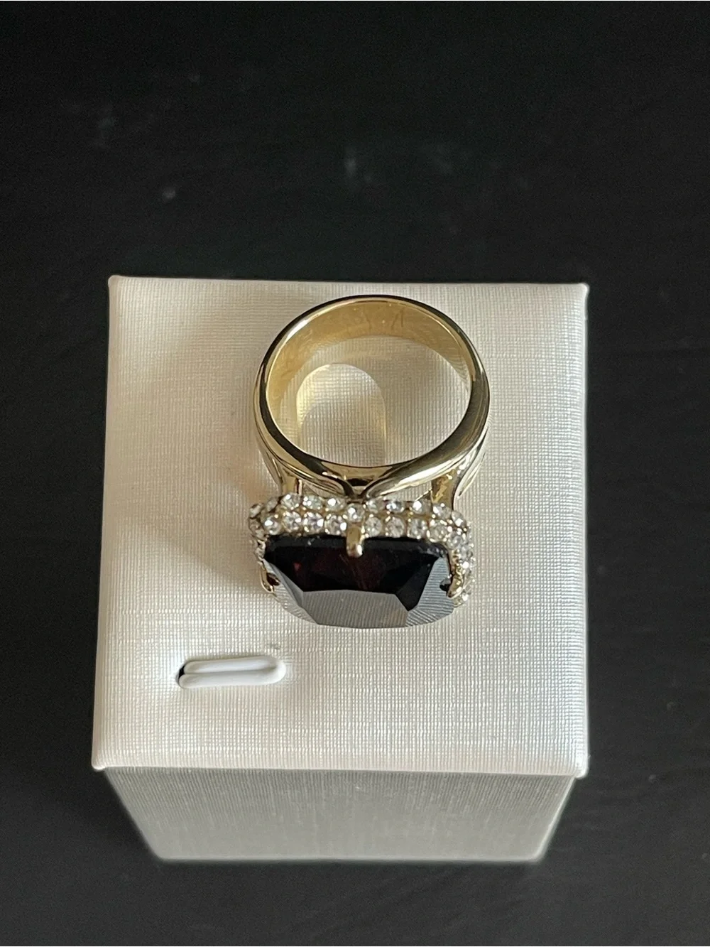 New gold tone simulated smoky quartz ring.